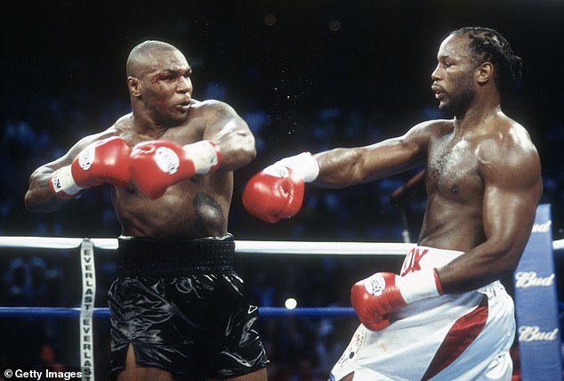 Lennox Lewis (right) defeated Iron Mike but insisted he always respected Tyson's power