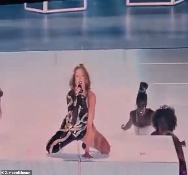 Crouching on a platform surrounded by her backup dancers, she seductively dropped twice in a row — a slight but sexier change from the same dance routine seen during her Eras Tour concert film.