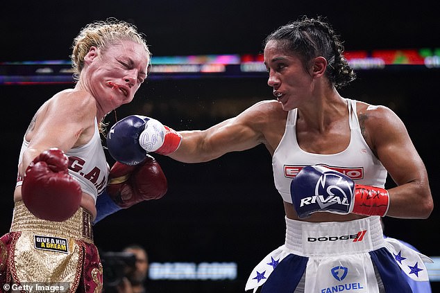 Serrano (pictured above fighting Heather Hardy) has won multiple titles at multiple weights