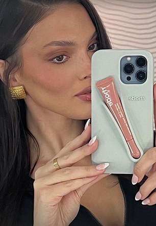 Kendall Jenner is pictured with her Rhode phone case