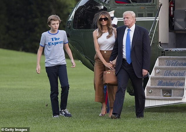 Melania Trump spent much of her term as first lady raising her son Barron – above is Barron, Melania and then-President Donald Trump in June 2017