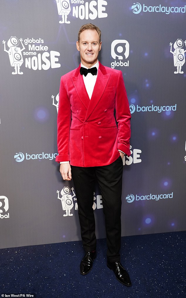 Meanwhile, TV presenter Dan Walker opted to use the color in a bright red crushed velvet blazer, teamed with a white shirt and black bow tie.