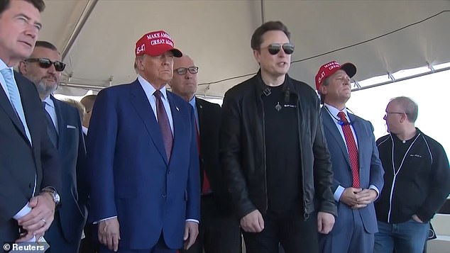 Donald Trump and Elon Musk at SpaceX headquarters in South Texas on Wednesday. Several lawmakers can also be seen flanking the pair, including (left to right) Sens. Hagerty, Cruz and Cramer. Rep. Ronny Jackson, R-Texas, can be seen in the MAGA hat to Musk's right