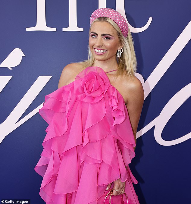 Leary (pictured at this year's Melbourne Cup) said she was 21 when she tried to commit suicide but was interrupted by a stranger