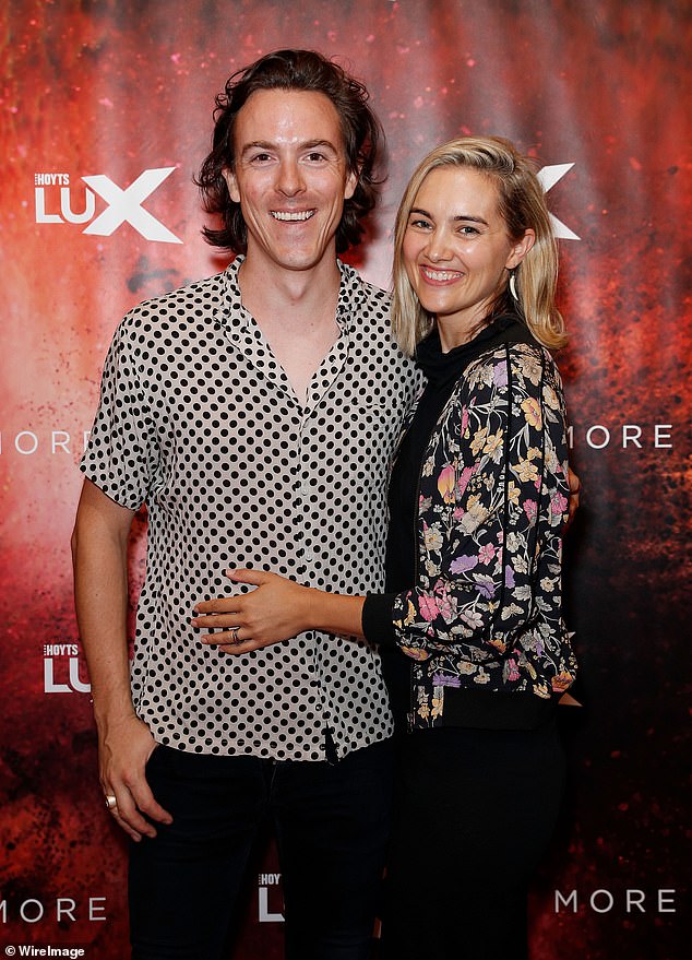 Lizzie bears a striking resemblance to Tim's ex-wife Monique (pictured together in March 2018). The former couple, who share three children, announced their divorce almost a year ago