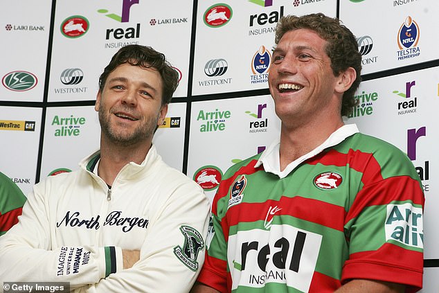 Fletcher said he once put Hollywood star and Souths owner Russell Crowe (pictured together) through a wall during a footy bonding session in a pub