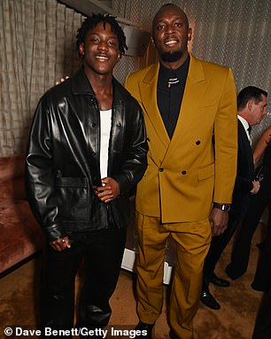 Mainoo pictured with Usain Bolt