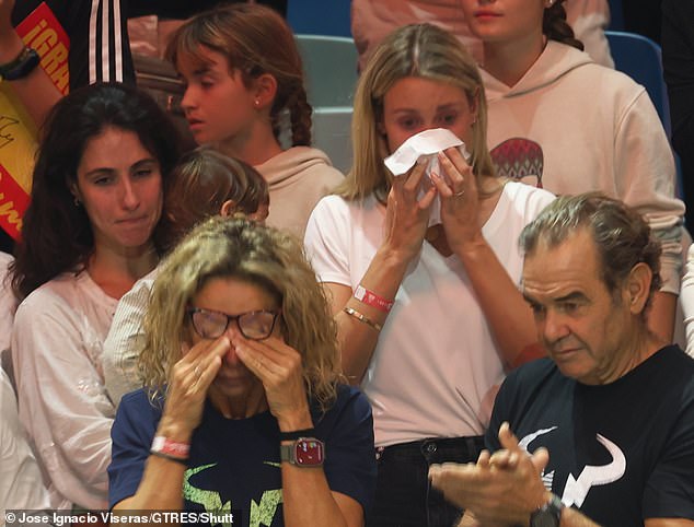 Not a dry eye in the house: Nadal's family, including his wife Maria 'Xisca' Perello and sister Maria Isabel Nadal (middle row, left and centre) burst into tears as Nadal played in the Davis Cup match against Dutchman Botic of the Zandschhulp cashed