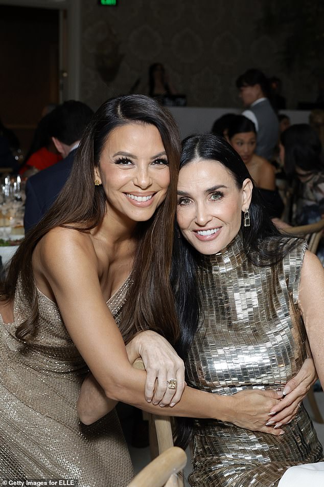 She was also spotted with Demi Moore (pictured), Melanie Griffith, Danielle Deadwyler and Ariana Greenblatt as the women enjoyed the festive evening