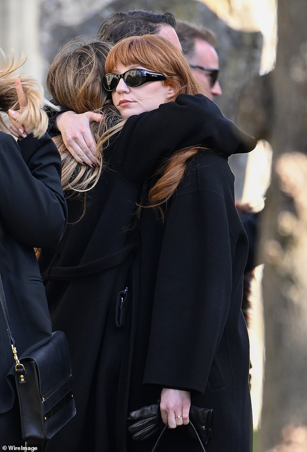 Nicola Roberts, a member of the pop group Girl's Aloud, was among the first mourners to arrive