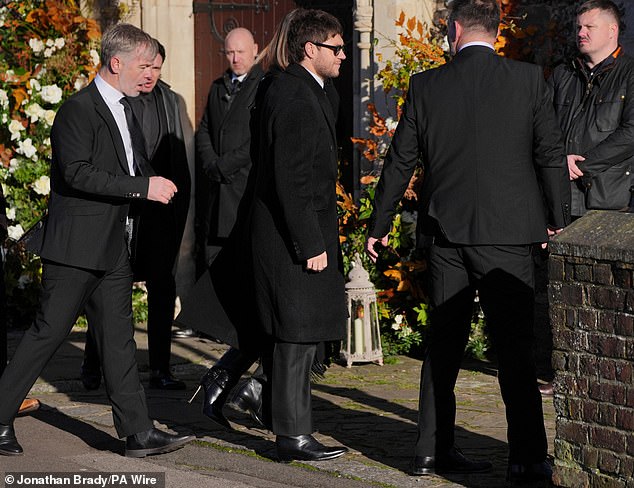 Niall greeted other mourners at the service