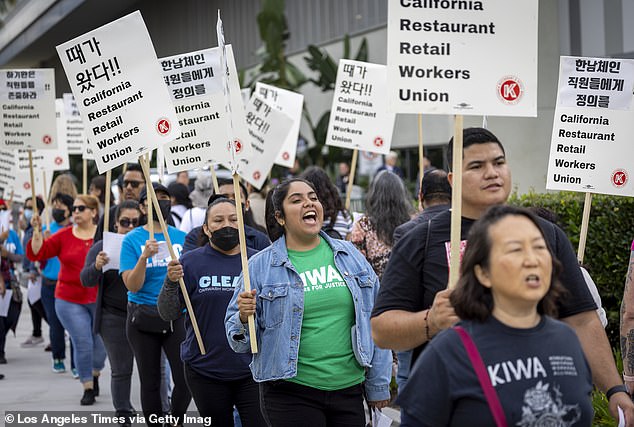 A union demonstrating for wage rights in California (photo). One factor that experts say may have prevented the bill's passage is that specific sectors already have higher minimum wages