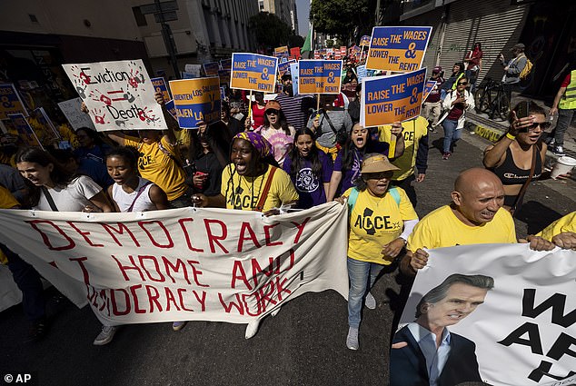 Protesters gathered for better wages (photo). Supporters of the rejected proposal said it would have raised wages for more than 2 million workers