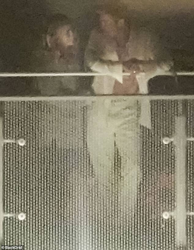 At one point, he placed his arms over the railing while apparently having a serious conversation with Condon's own character, Kate.