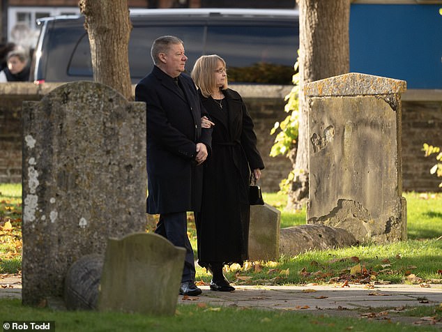 Liam Payne's father Geoff and mother Karen arrive for their son's funeral service today