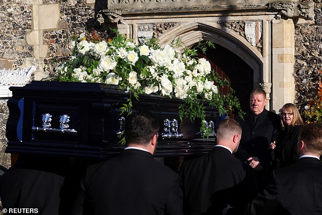 Liam Payne's coffin is brought into the church as his father Geoff and mother Karen look on