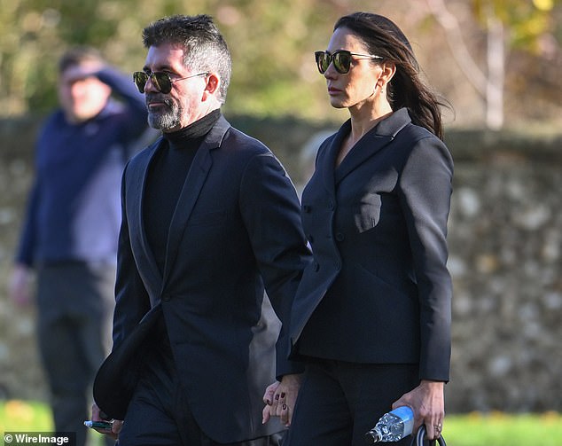 Simon Cowell arrives at the church today, accompanied by his partner Lauren Silverman