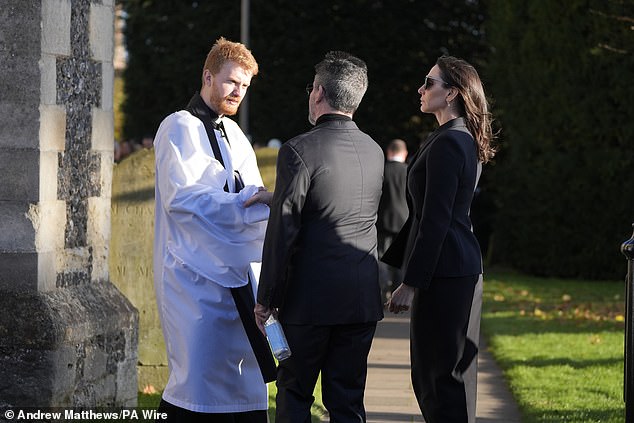 Simon Cowell (center) and Lauren Silverman (right) after the service