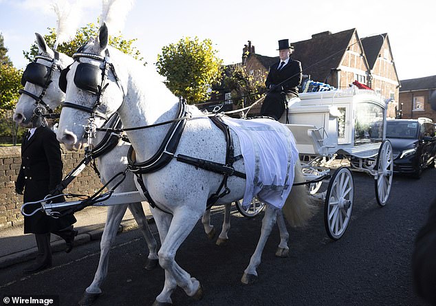 Liam Payne's horse-drawn coffin arrives at the church