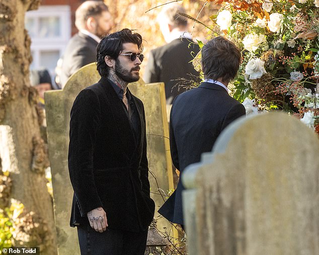 Bandmate Zayn Malik at the funeral today