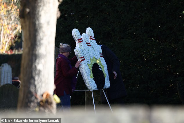 A floral arrangement of bowling pins was on display in the church