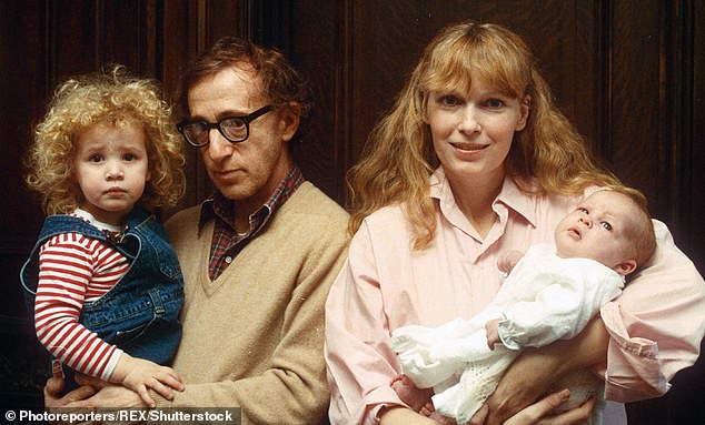 Ronan is the eldest son of Rosemary's Baby star Mia Farrow and disgraced filmmaker Woody Allen; (L-R) Dylan Farrow, Woody Allen, Mia Farrow and Ronan Farrow seen in 1988