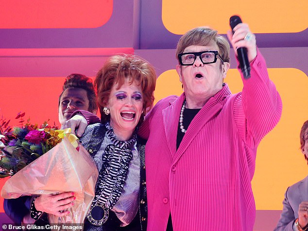 Katie Brayben – who plays Tammy Faye – and Elton John during the opening night curtain call for the new Elton John musical