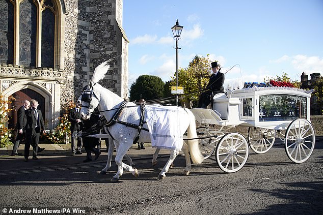 A horse-drawn carriage carrying Liam Payne's coffin arrives for the One Direction singer's funeral service at St Mary's Church in Amersham