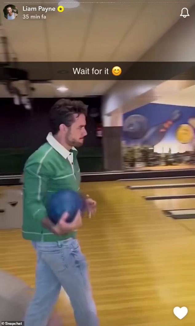 Liam (photo) at the bowling alley. His girlfriend Kate previously said: 'He takes me bowling at least four times a week'