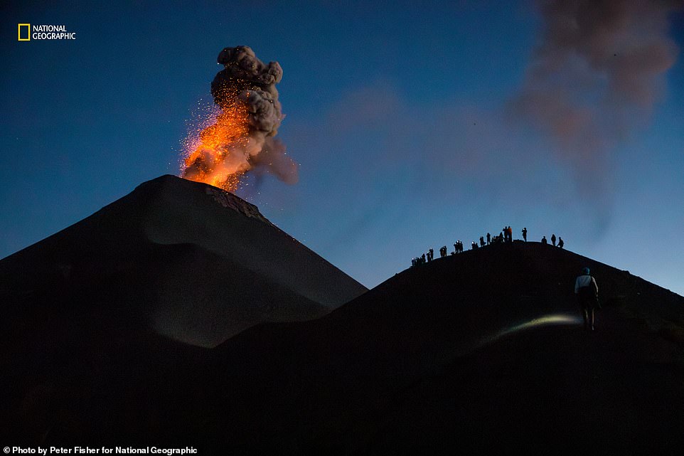 A mesmerizing shot of Guatemala's Fuego volcano, which has been erupting continuously since 2002. Nat Geo reveals: 'A one-day hike to its sleeping twin, Acatenango, and through a valley rewards adventurers with a view from the Fuego ridge. Eruptions can occur several times a day'