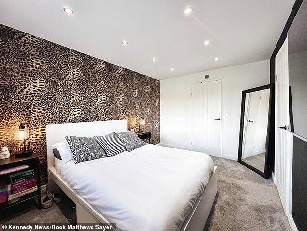 Leopard print can also be seen on the wall of the master bedroom in the house