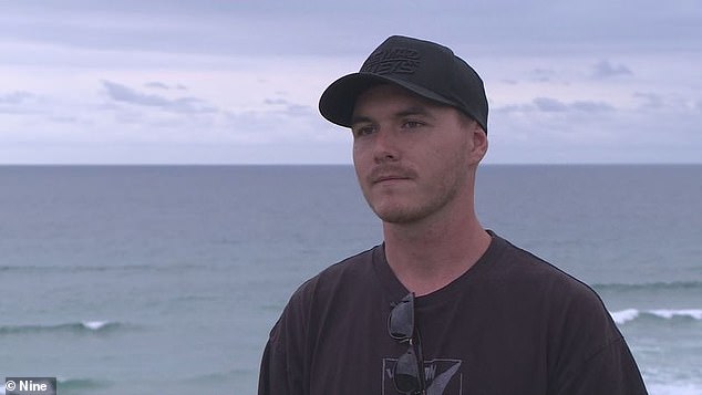 Kye Wilkinson, 23, felt the shark before he saw it as he swam under his surfboard