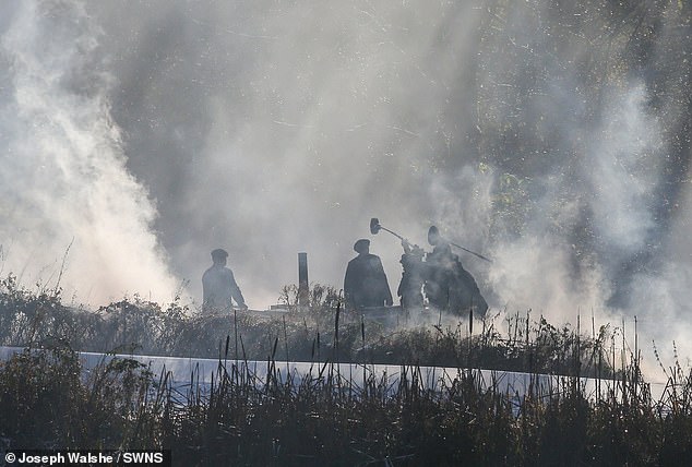 Steam and smoke billowed from the water, creating the grimy industrial atmosphere made famous in the hit show