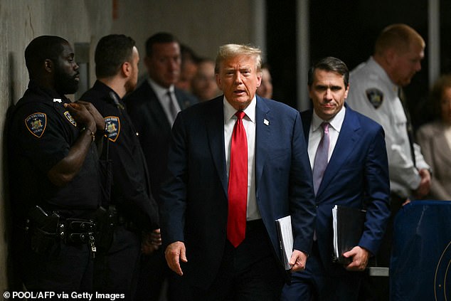 Former US President Donald Trump walks to the press with his lawyer Todd Blanche at the end of the day of his trial to speak about his alleged cover-up of hush money payments related to extramarital affairs at the Manhattan Criminal Court in New York on May 16 City. 2024.