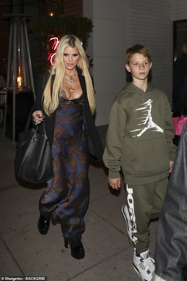 Jessica stepped out with her and Johnson's son Ace, 11