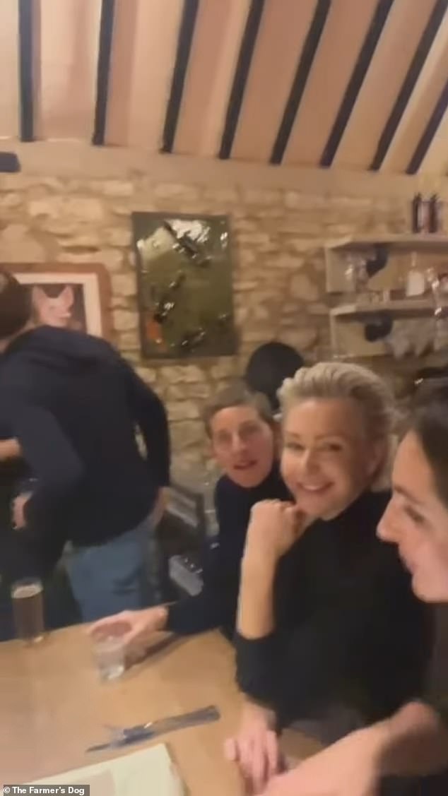 The couple, dressed in matching black tops, enjoyed a fun evening in the pub