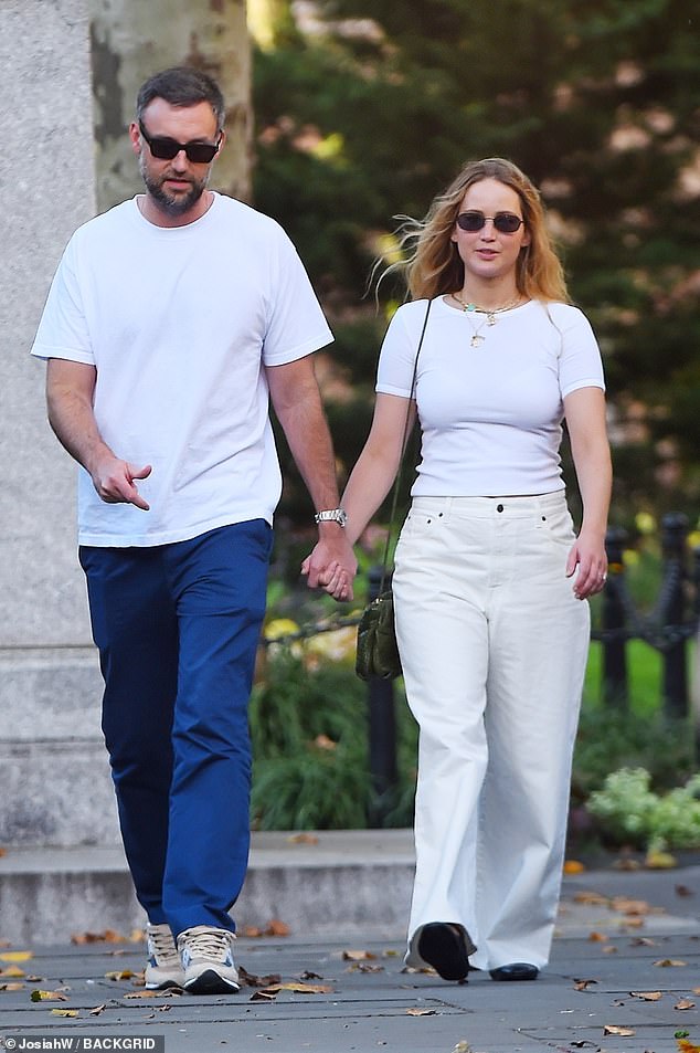 Jennifer is mother to son Cy with husband Cooke Maroney, 40; they welcomed their first child in February 2022; pictured in August 2022 in NYC