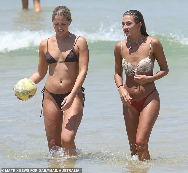 Sydney's hottest day is Sunday, but warm weather will continue until mid-week (pictured of swimmers at Bondi)