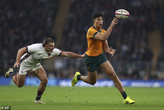 Suaalii made an explosive debut for the Wallabies against England (pictured) after being thrown into the deep end after the NRL season