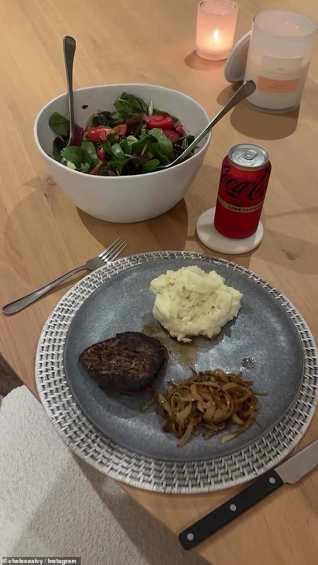 The footy WAG's dinner consists of another dose of protein from a small steak, some mash and onions, and a coke... Zero of course