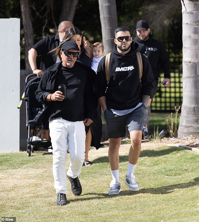 In one, the high-flying businessman poses with The Block producer Julian Cress, which Portelli shared on his Instagram on auction day. Pictured: The Block producer Julian Cress and Adrian Portelli (right)