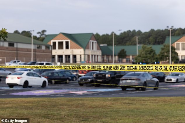 That fateful morning, the teen allegedly concealed the long-barreled pistol in a billboard neatly tucked into his book bag while aboard a school bus, a Georgia Bureau of Investigation agent said. Pictured: Police tape surrounds the area of ​​Apalachee High School on September 5, 2024 in Winder, Georgia