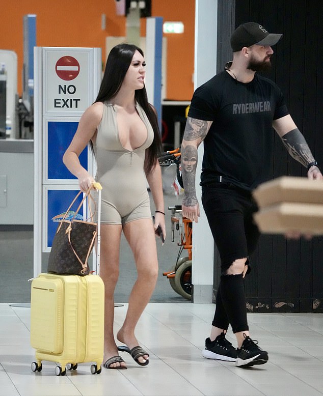 Kay was seen at the airport in a tight beige bodysuit, which she later wore during her studio appearance with Kyle and Jackie O.