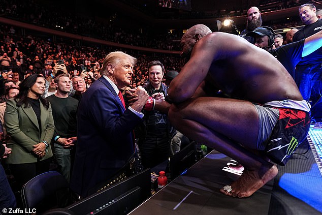 UFC heavyweight champion Jon Jones shares a handshake with Trump after his fight