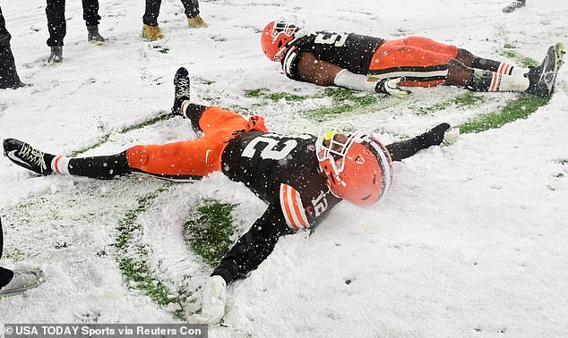 Cleveland Browns safety Rodney McLeod Jr. (12) and defensive end Ogbo Okoronkwo (54) celebrate after the Browns defeated the Pittsburgh Steelers at Huntington Bank Field