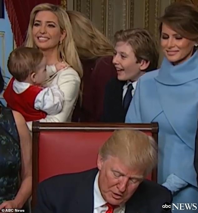 He then continued to coo at the adorable baby as his mother Melania looked at them both lovingly