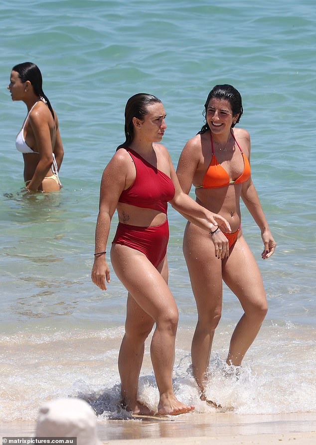 Sydney is set to be sweltering all weekend and the heatwave is expected to continue for much of the next week (pictured by people at Bondi Beach)