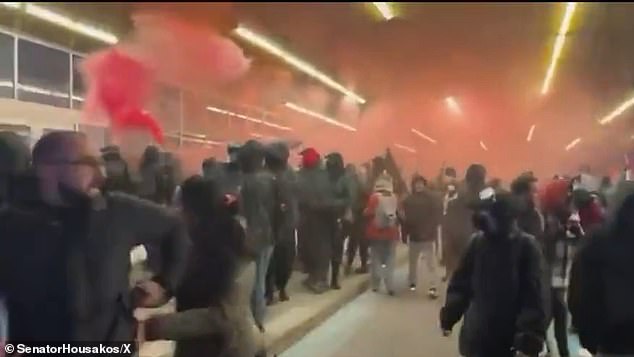 Many in the crowd wore face masks to identify their voices. Smoke bombs added to the chaos