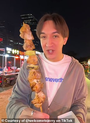 Jerry revealed that a very low crime rate is one of Seoul's many notable advantages. He is pictured above at a street food market