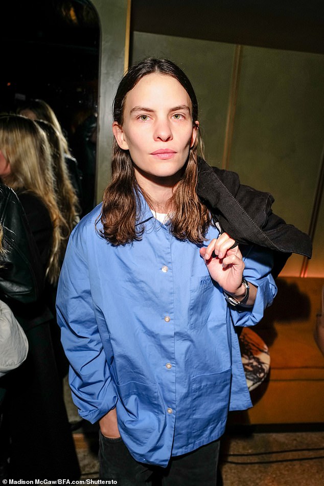 Singer Eliot looked smartly casual in a blue Miu Miu button-up shirt